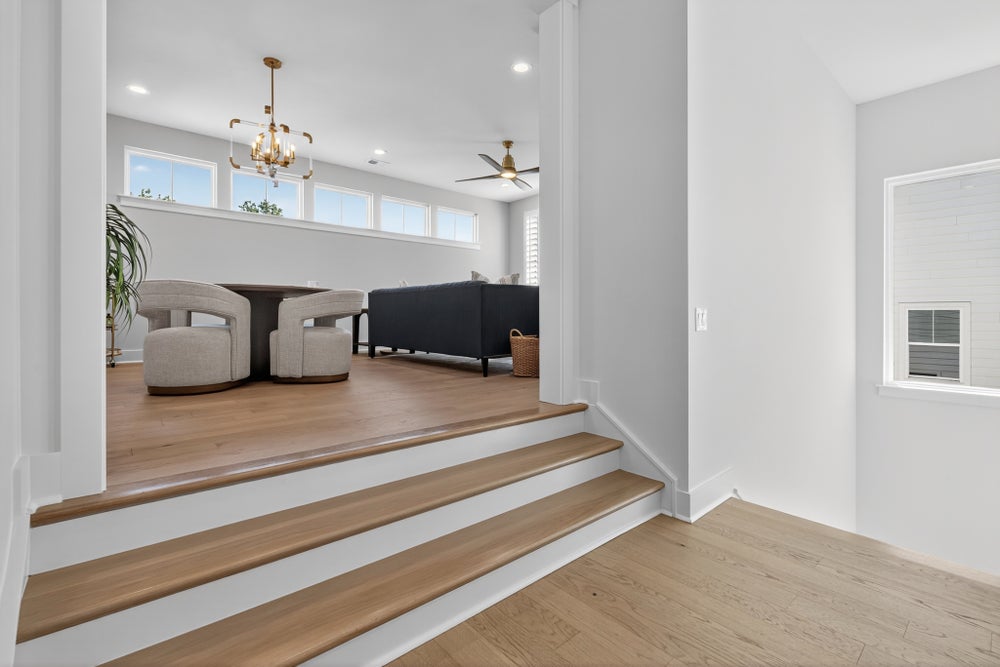 Step-up into the 2nd floor bonus room. Laguna Sur New Home Floor Plan