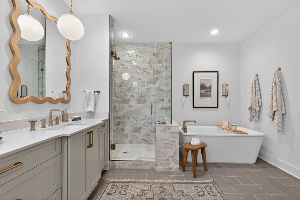 Primary bath suite with shower & a tub. 3,949sf New Home