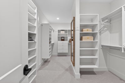 A Primary closet made for 2. Laguna Sur New Home Floor Plan