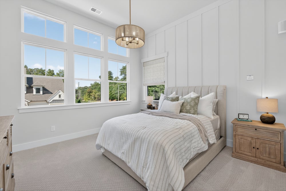 Bedroom 2 with large windows. 3,949sf New Home