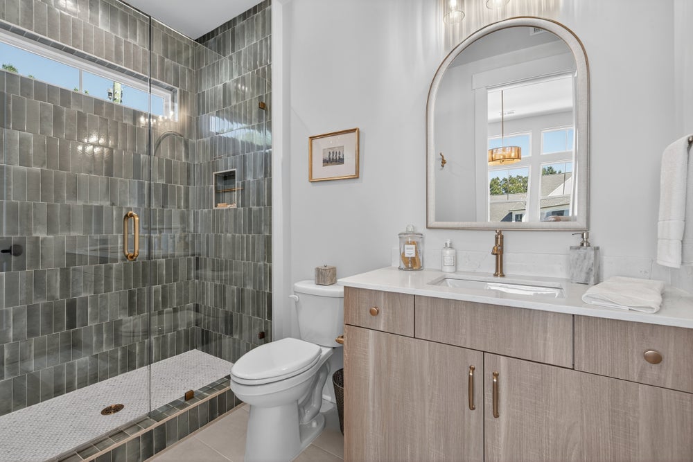 En-suite bath with a shower. 3,949sf New Home