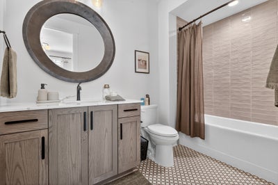 En-suite bath with a tub. 3,949sf New Home