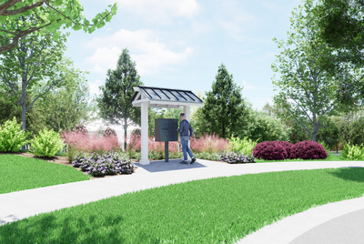 Covered kiosk with metal roof in landscaped community park with walking paths