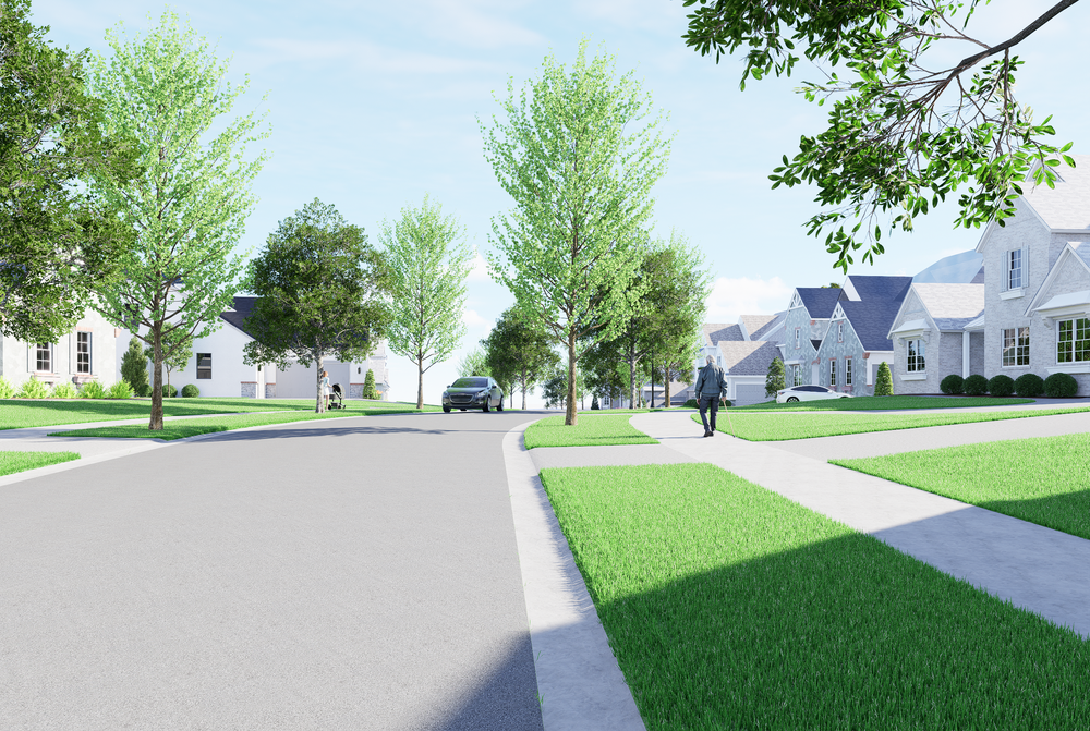 Suburban street with sidewalks, tree-lined lawns, and modern homes with attached garages