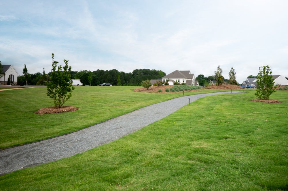 Wander through the community green space. New Homes in Huntersville, NC