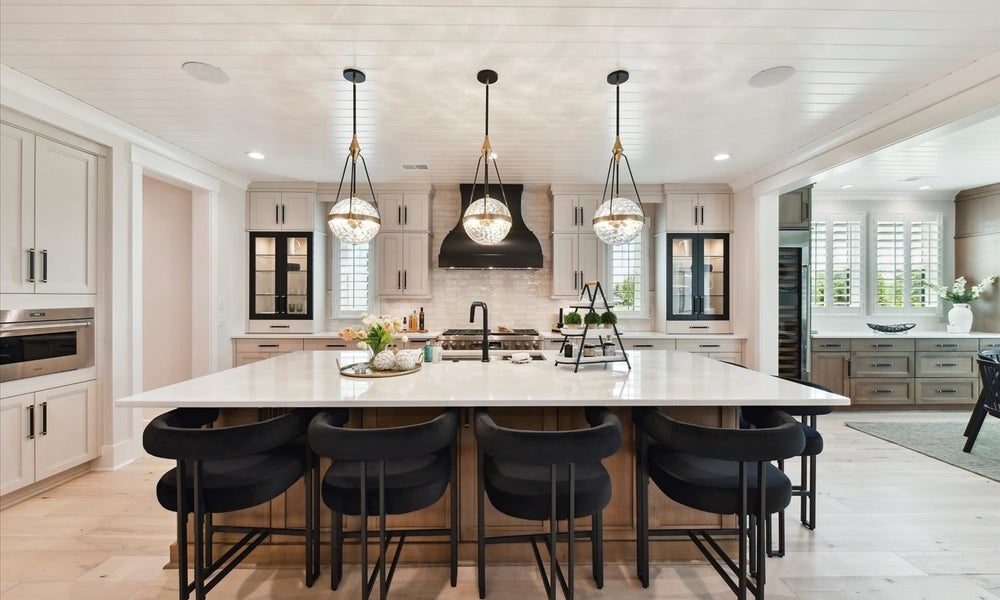 Gather around the island built for 6. 4,777sf New Home in Huntersville, NC