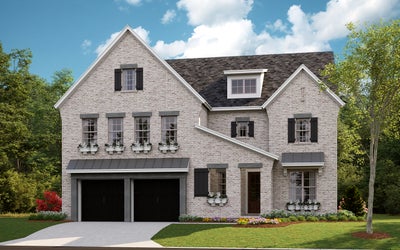 Two-story brick home with two-car garage, black shutters, and flower box windows