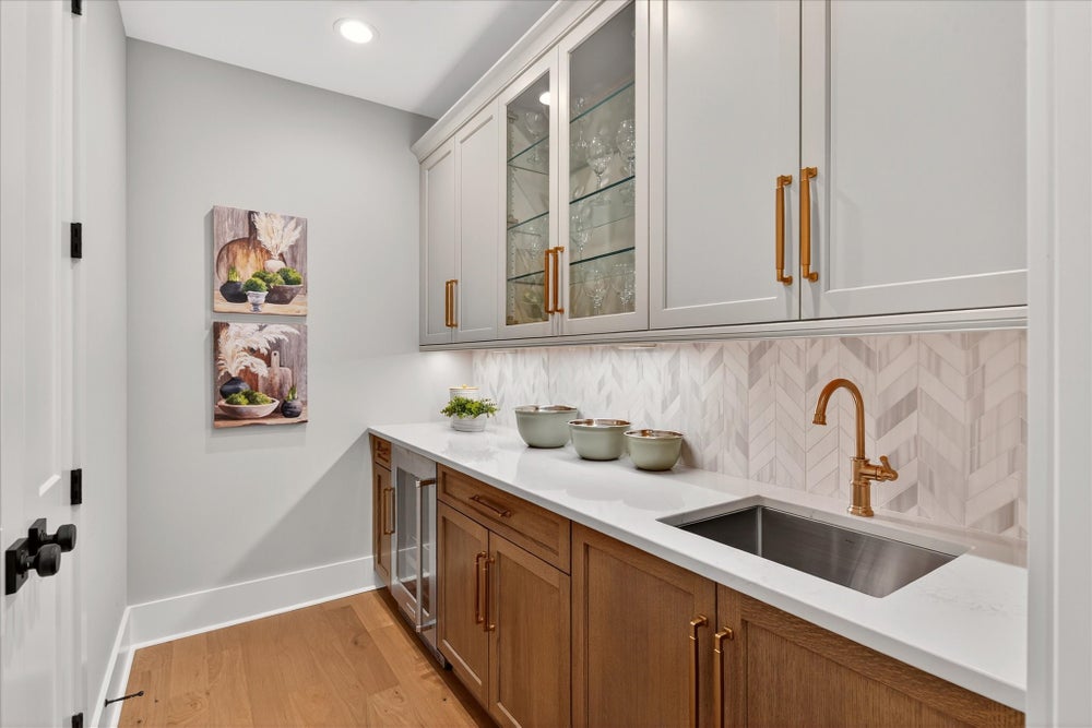 Scullery and pantry area is hidden away. New Home in Huntersville, NC