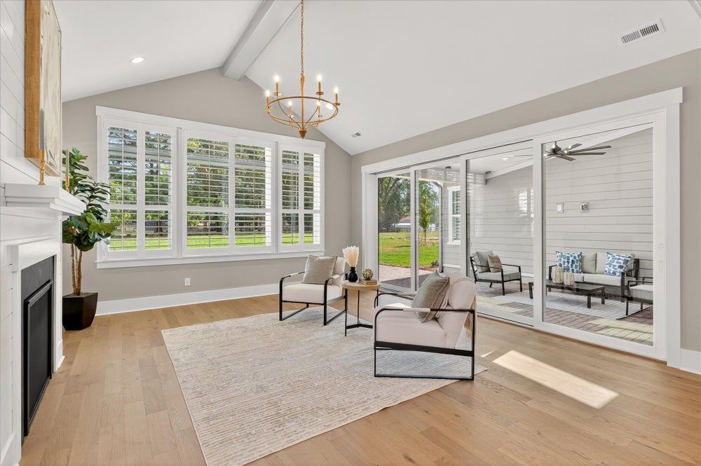 Great Room leads into the outdoor living. 3,734sf New Home in Huntersville, NC