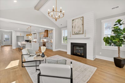 Great Room with a fireplace. 5br New Home in Huntersville, NC