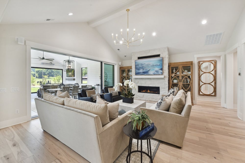 Great Room Sample featuring the Multi-Slide Stacking Door Custom Option. Montecito Home with 3 Bedrooms