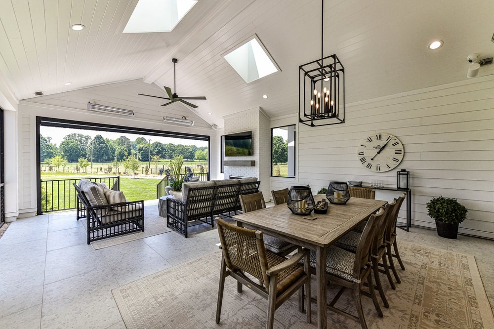 Outdoor Living Sample featuring the Fireplace, Skylights, and Luxury Expanded Custom Options. 3,776sf New Home