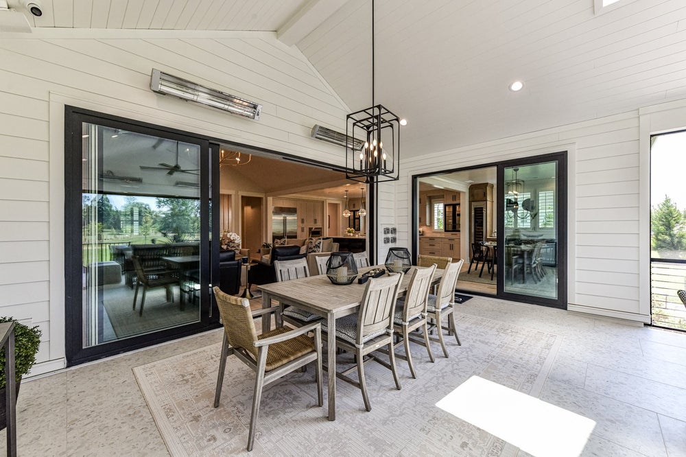 Outdoor Living Sample featuring the Fireplace, Skylights, and Luxury Expanded Custom Options. 3,776sf New Home