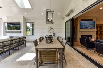 Outdoor Living Sample featuring the Fireplace, Skylights, and Luxury Expanded Custom Options. 3,776sf New Home