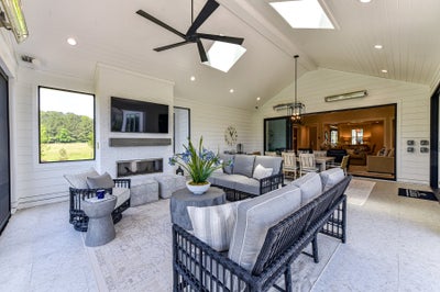 Outdoor Living Sample featuring the Fireplace, Skylights, and Luxury Expanded Custom Options. 3,776sf New Home