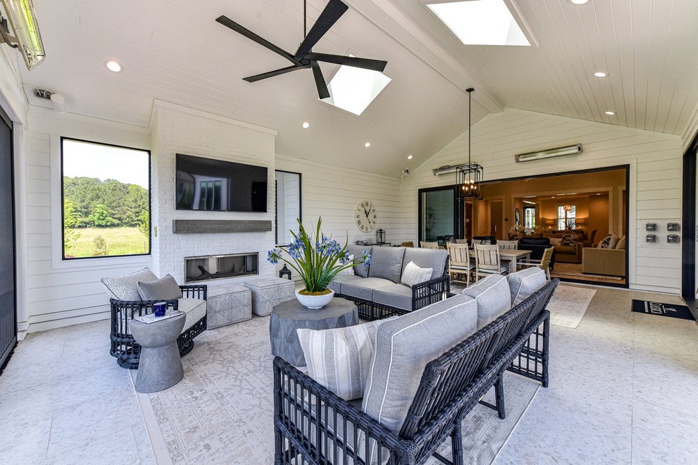Outdoor Living Sample featuring the Fireplace, Skylights, and Luxury Expanded Custom Options. 3,776sf New Home