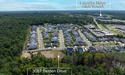Aerial view of residential neighborhood with rows of homes near Catawba Ridge High School