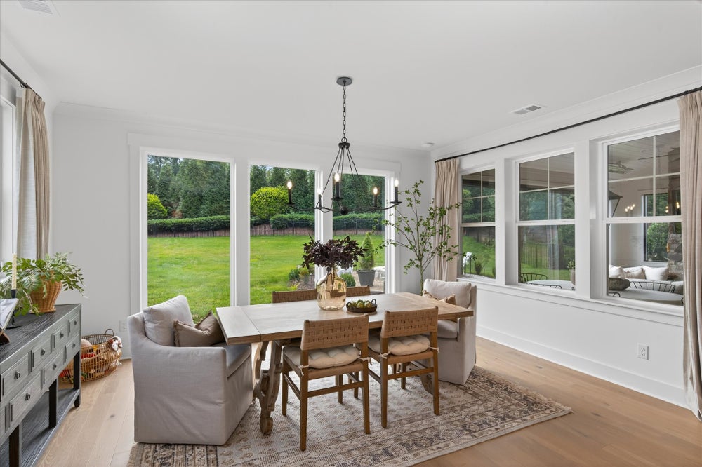 Dining Area with Storefront windows. 5703 Heirloom Crossing Court, Charlotte, NC