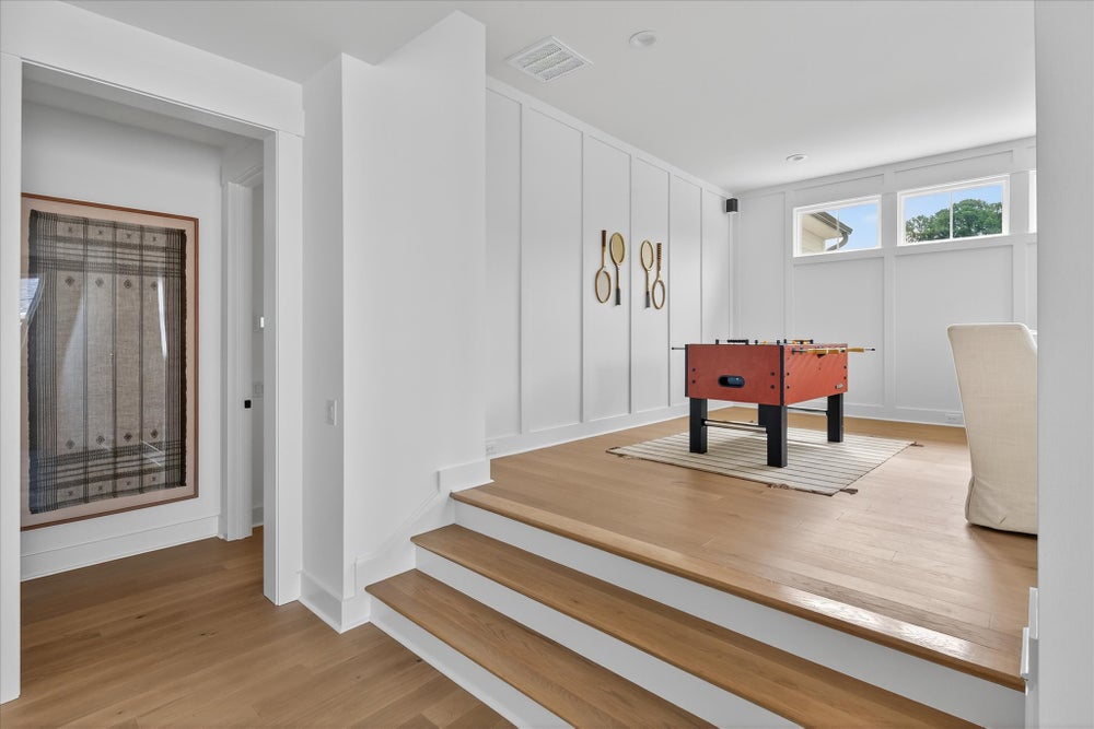 Step into the upstairs bonus room. 4br New Home in Charlotte, NC