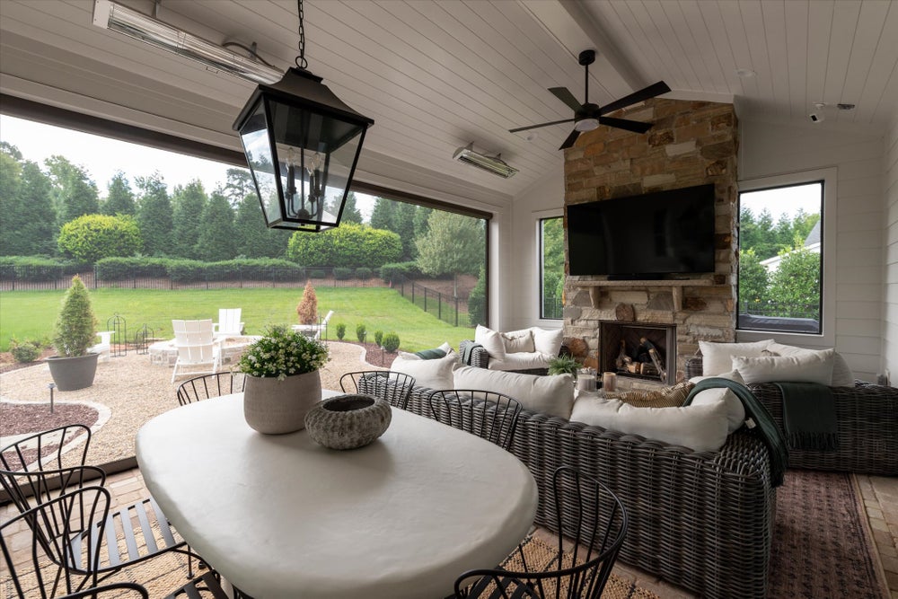 Outdoor Living with fireplace & heaters. 5703 Heirloom Crossing Court, Charlotte, NC