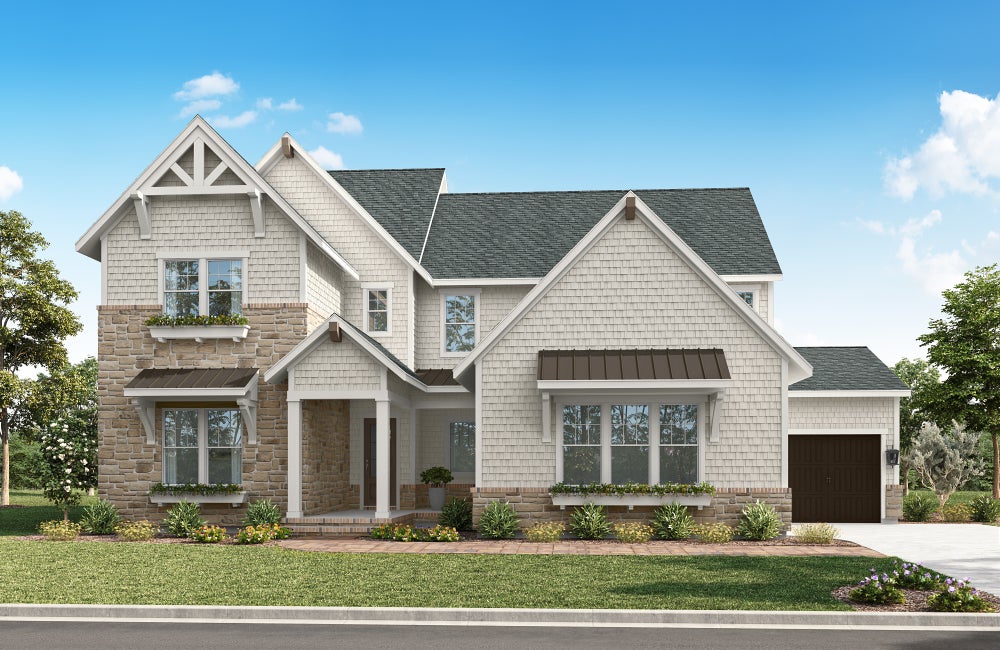 Two-story craftsman home with stone and shingle exterior, covered porch, and attached garage
