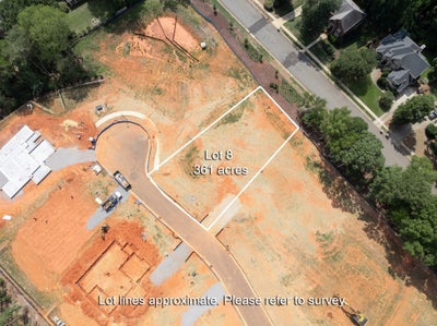 Aerial view of Lot 8, a 0.361-acre vacant residential lot in a new subdivision under development.